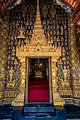 Wat Xieng Thong temple in Luang Prabang, Laos. The main entrance of the sim. 